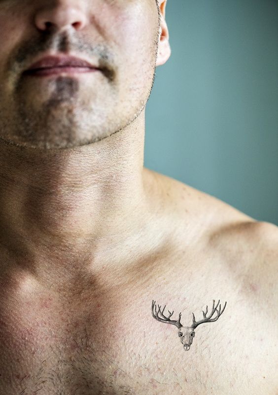 Black Ink Deer Skull Tattoo on Chest